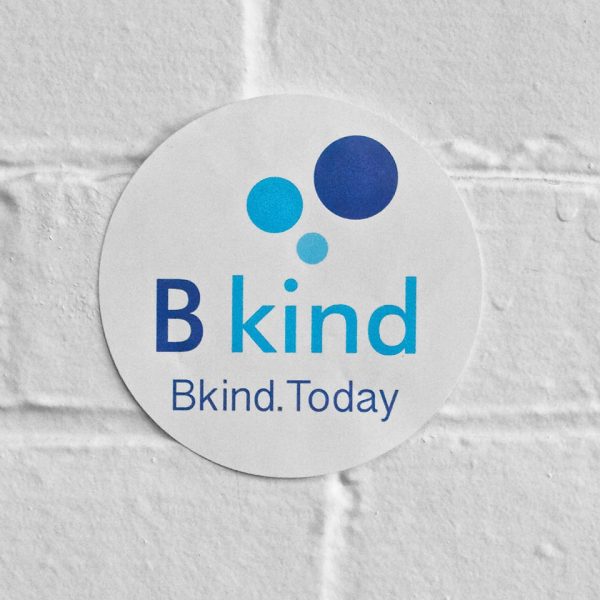 A sticker that says bkind today on it.