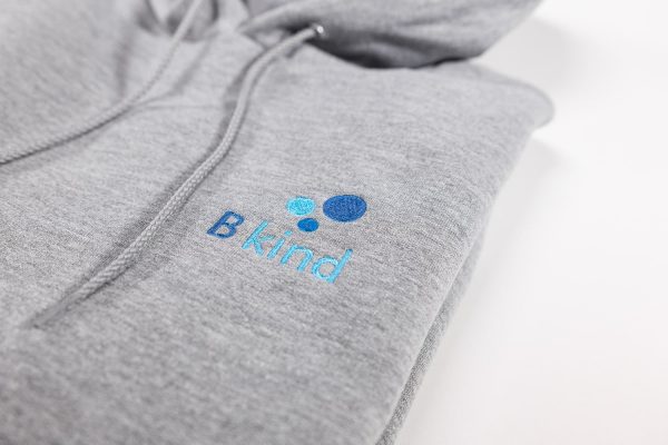 A close up of the logo on a hoodie