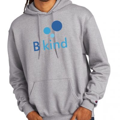 A man wearing a grey hoodie with the word " blind ".