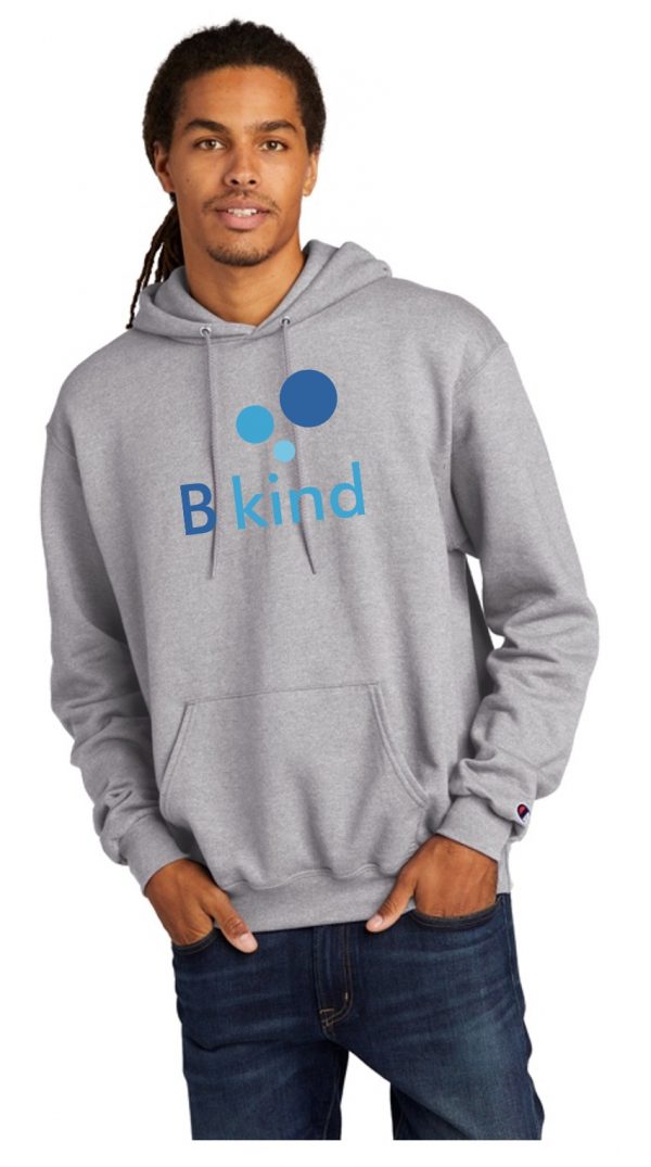 A man wearing a grey hoodie with the word " blind ".