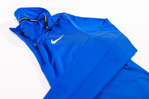 A close up of the nike jacket on a white background