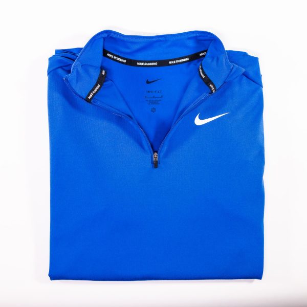 A blue nike shirt with an open zipper.