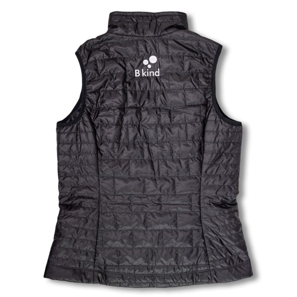 A black vest with a white logo on it