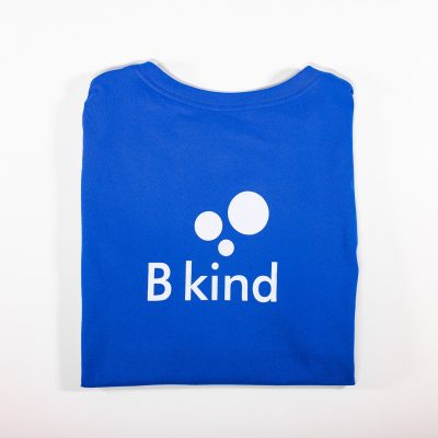 A blue t-shirt with the word " b kind ".